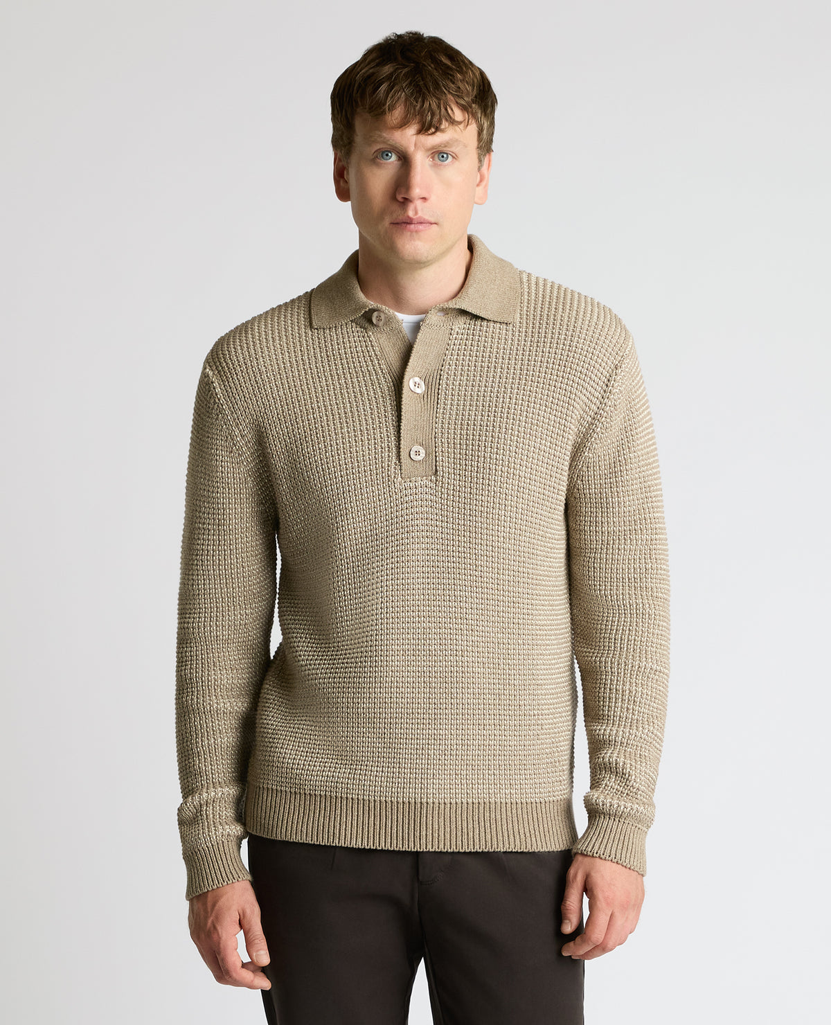 Man wearing a sand Cotton Knit Polo Sweater