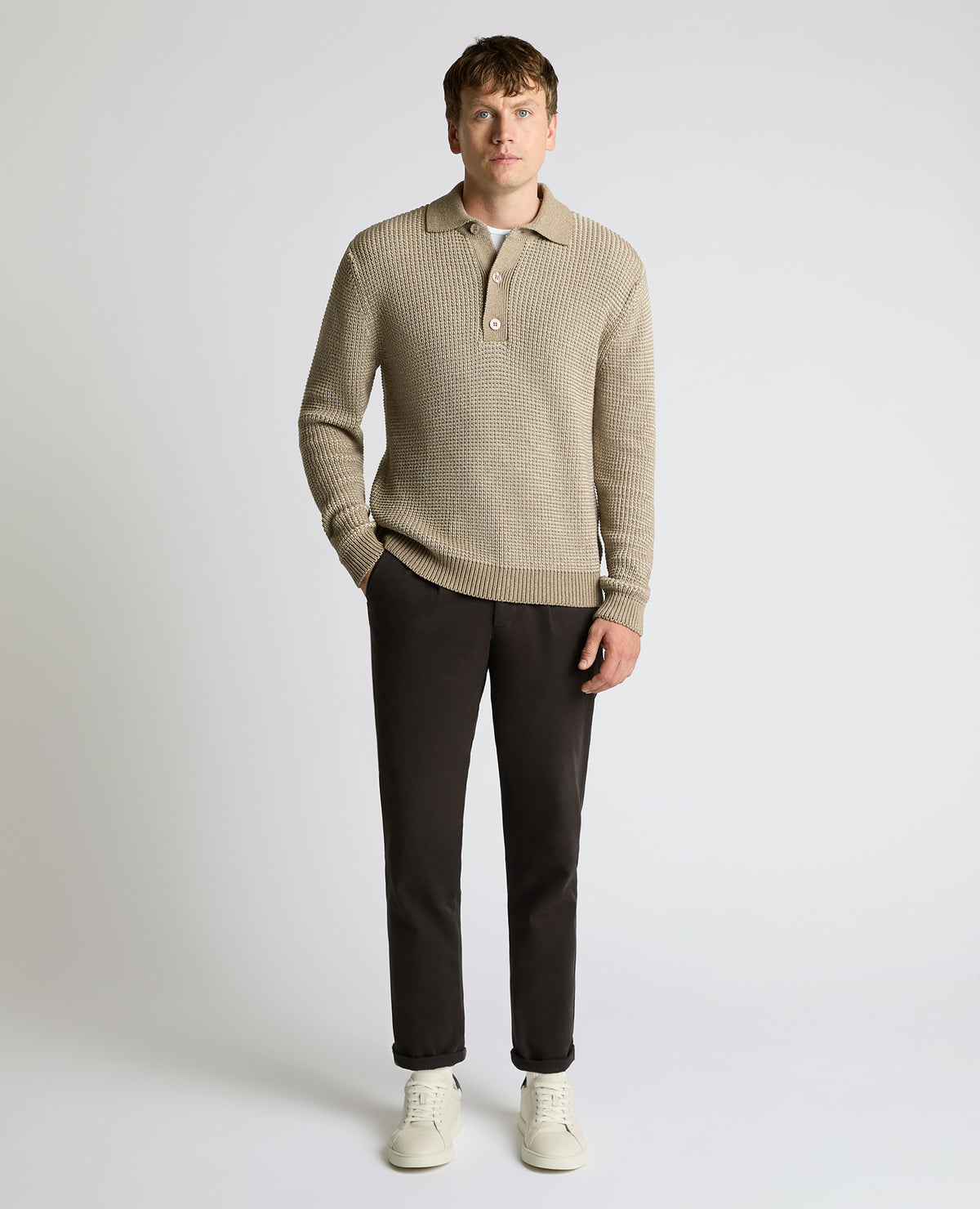 Man wearing a sand Cotton Knit Polo Sweater