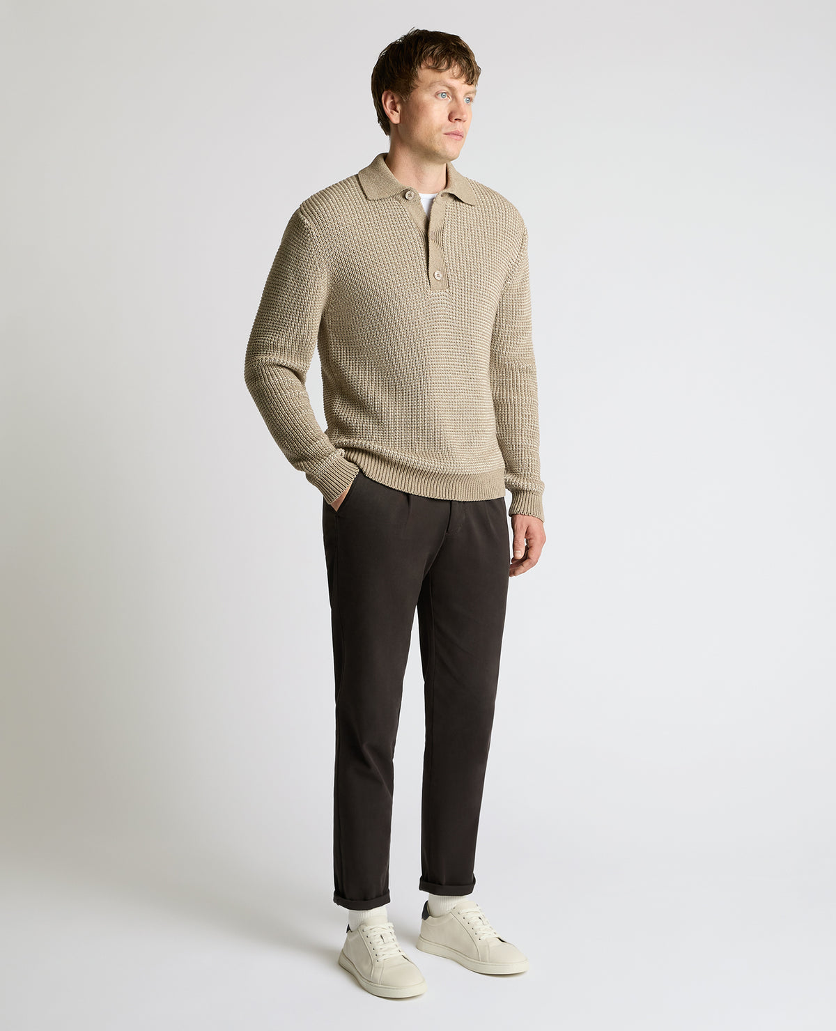 Man wearing a sand Cotton Knit Polo Sweater