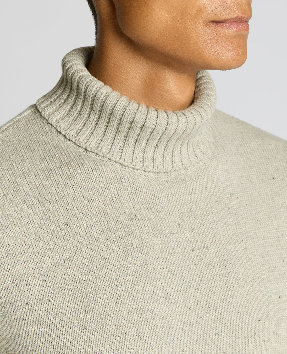 Man wearing a grey Roll Neck Cotton Knit Sweater