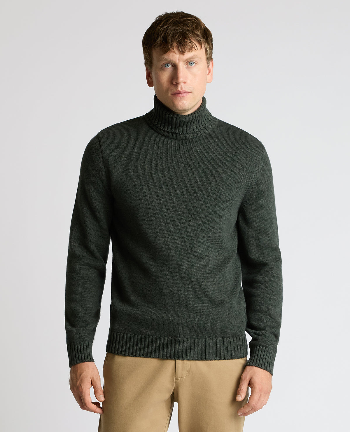 Man wearing a green Roll Neck Cotton Knit Sweater