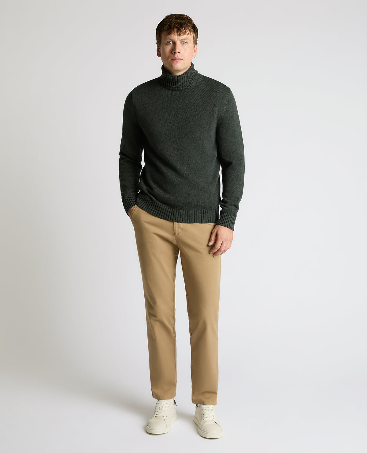Man wearing a green Roll Neck Cotton Knit Sweater