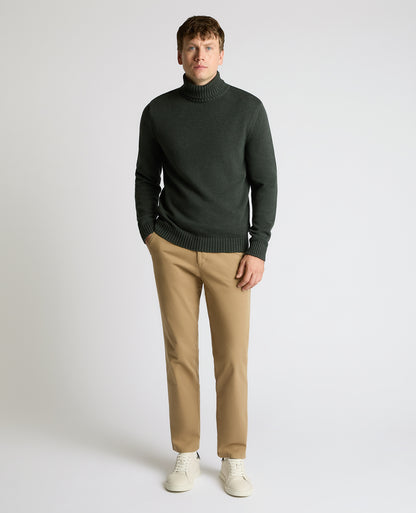 Man wearing a green Roll Neck Cotton Knit Sweater