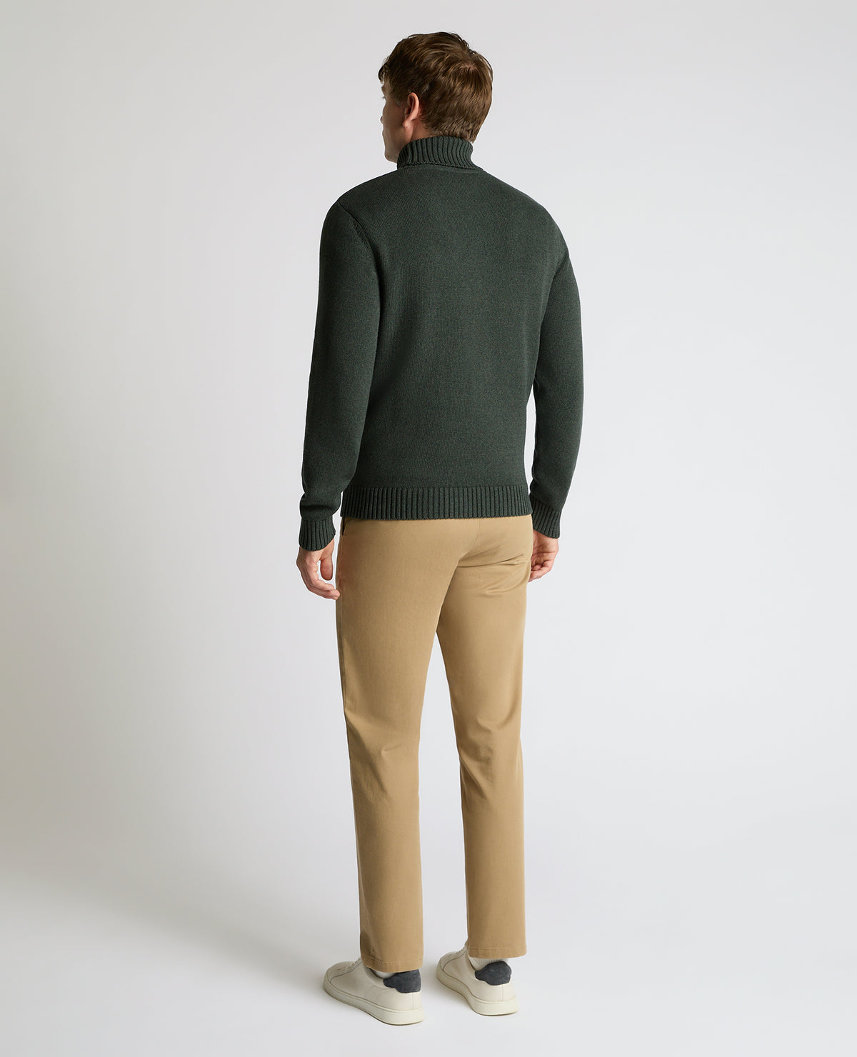 Man wearing a green Roll Neck Cotton Knit Sweater