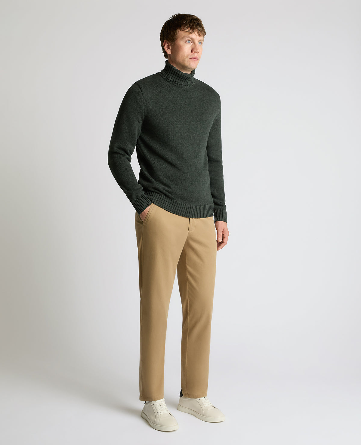 Man wearing a green Roll Neck Cotton Knit Sweater