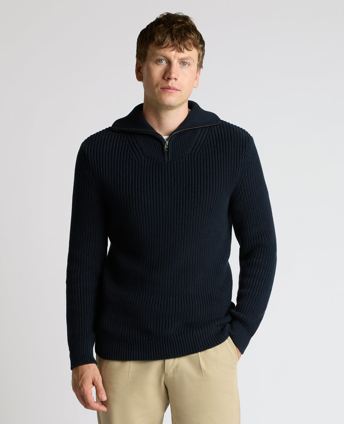 Man wearing a navy Cotton Funnel Neck Knit Sweater