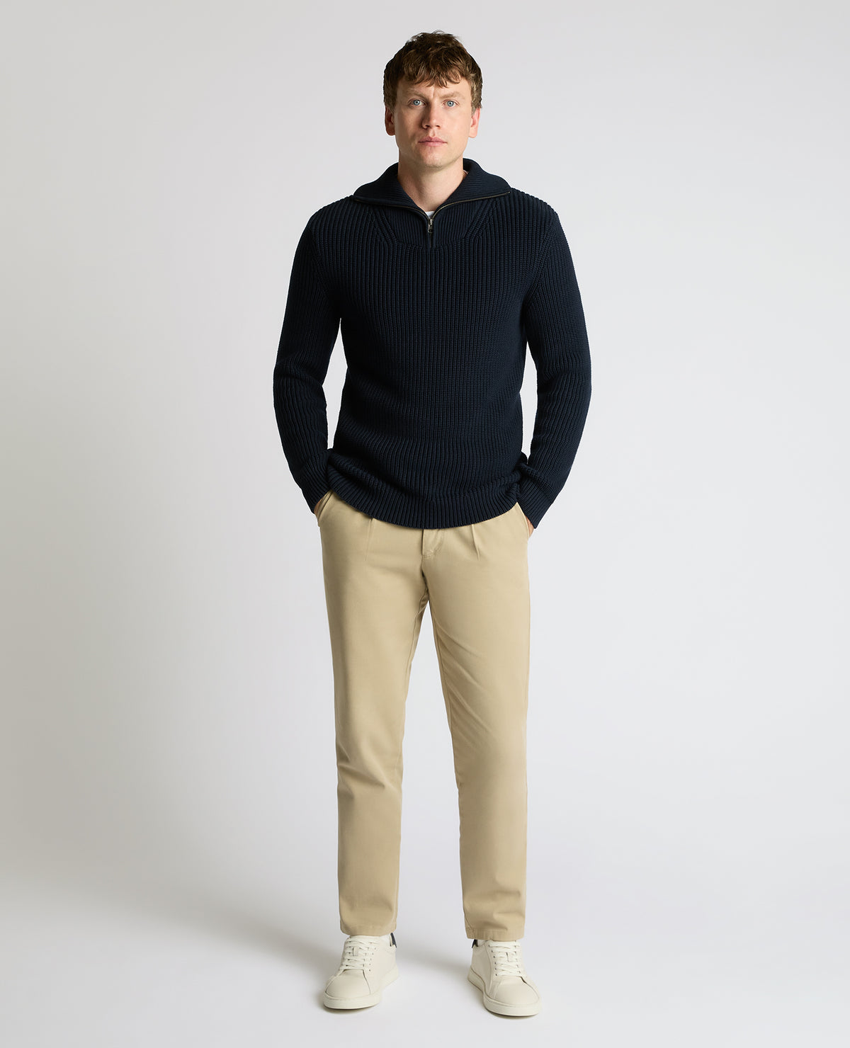 Man wearing a navy Cotton Funnel Neck Knit Sweater