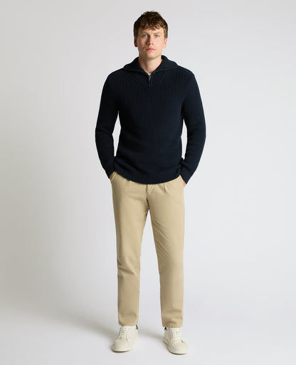 Man wearing a navy Cotton Funnel Neck Knit Sweater