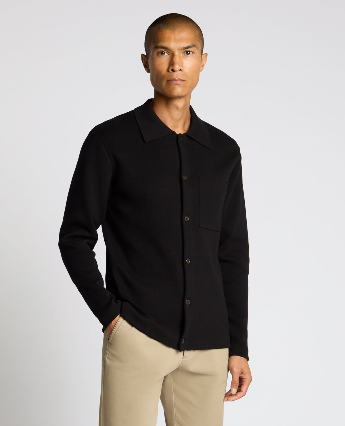Man wearing a black Button-Up Cotton Cardigan