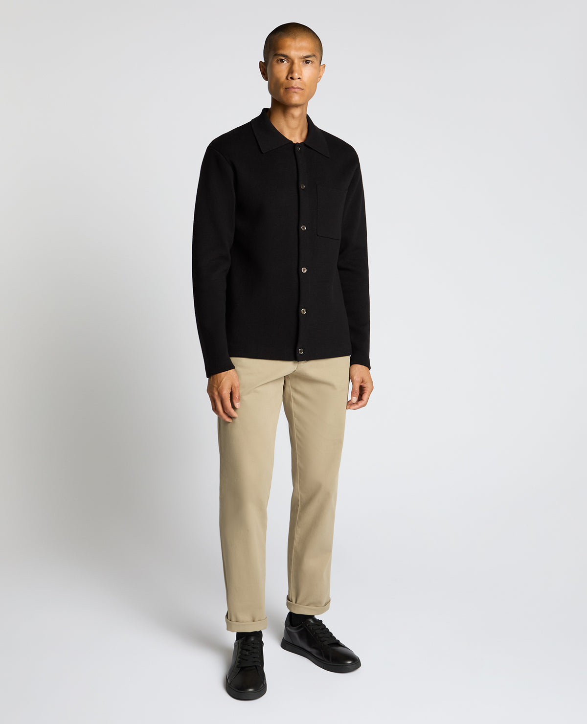 Man wearing a black Button-Up Cotton Cardigan