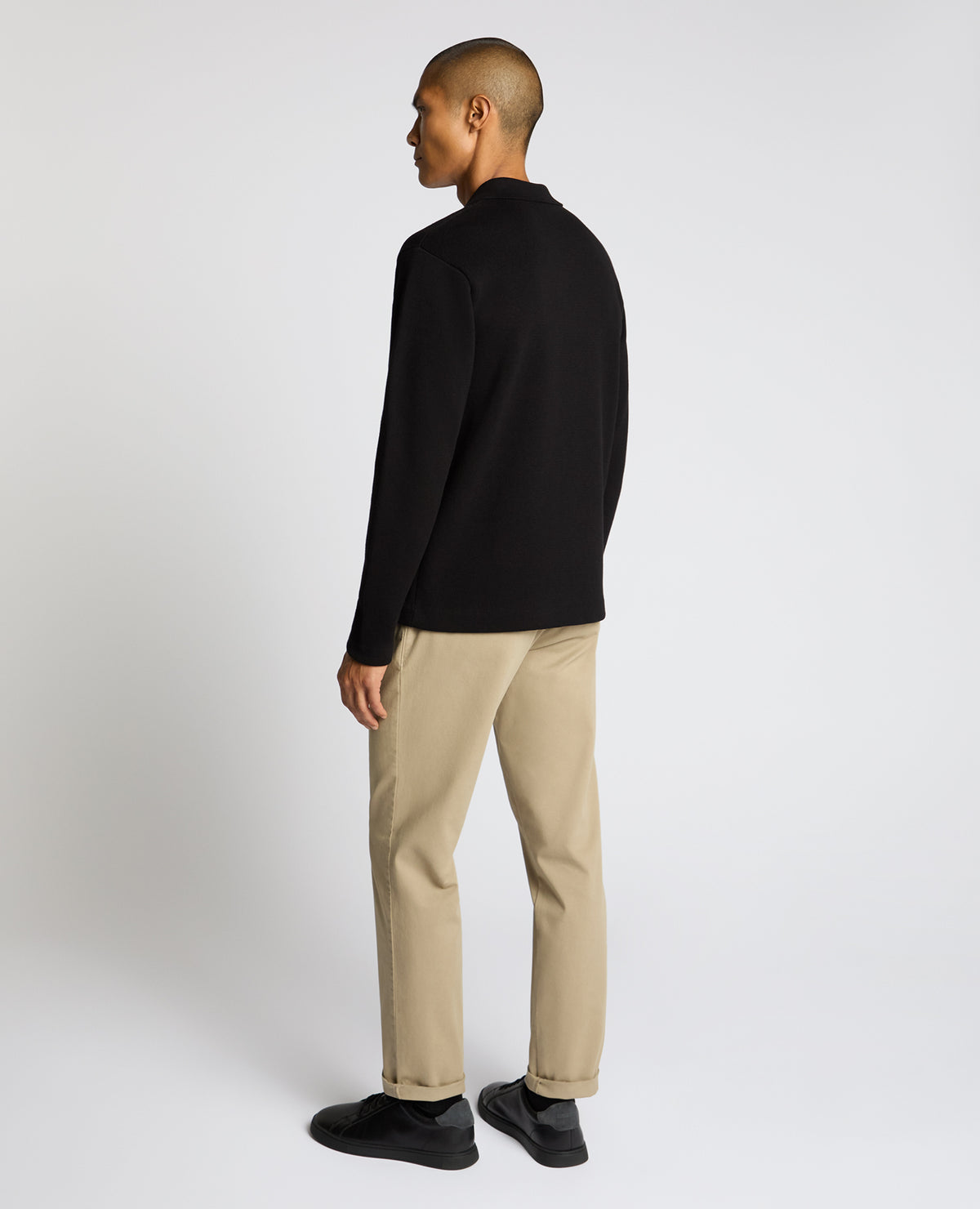 Man wearing a black Button-Up Cotton Cardigan