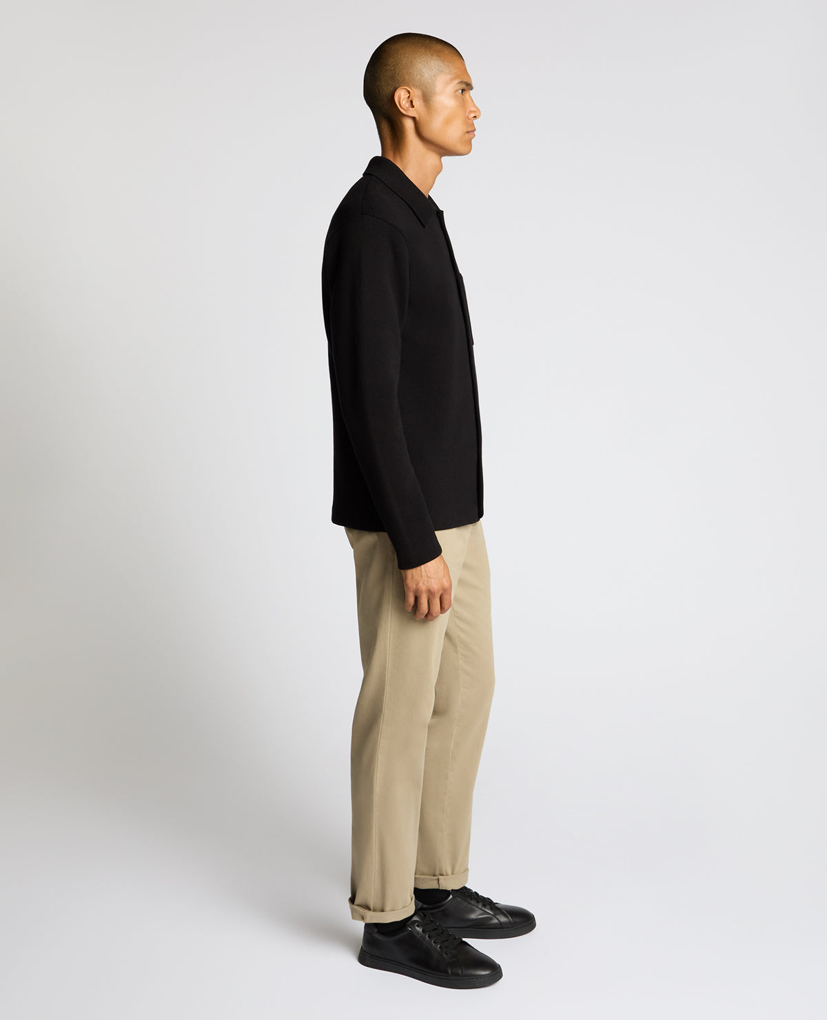 Man wearing a black Button-Up Cotton Cardigan