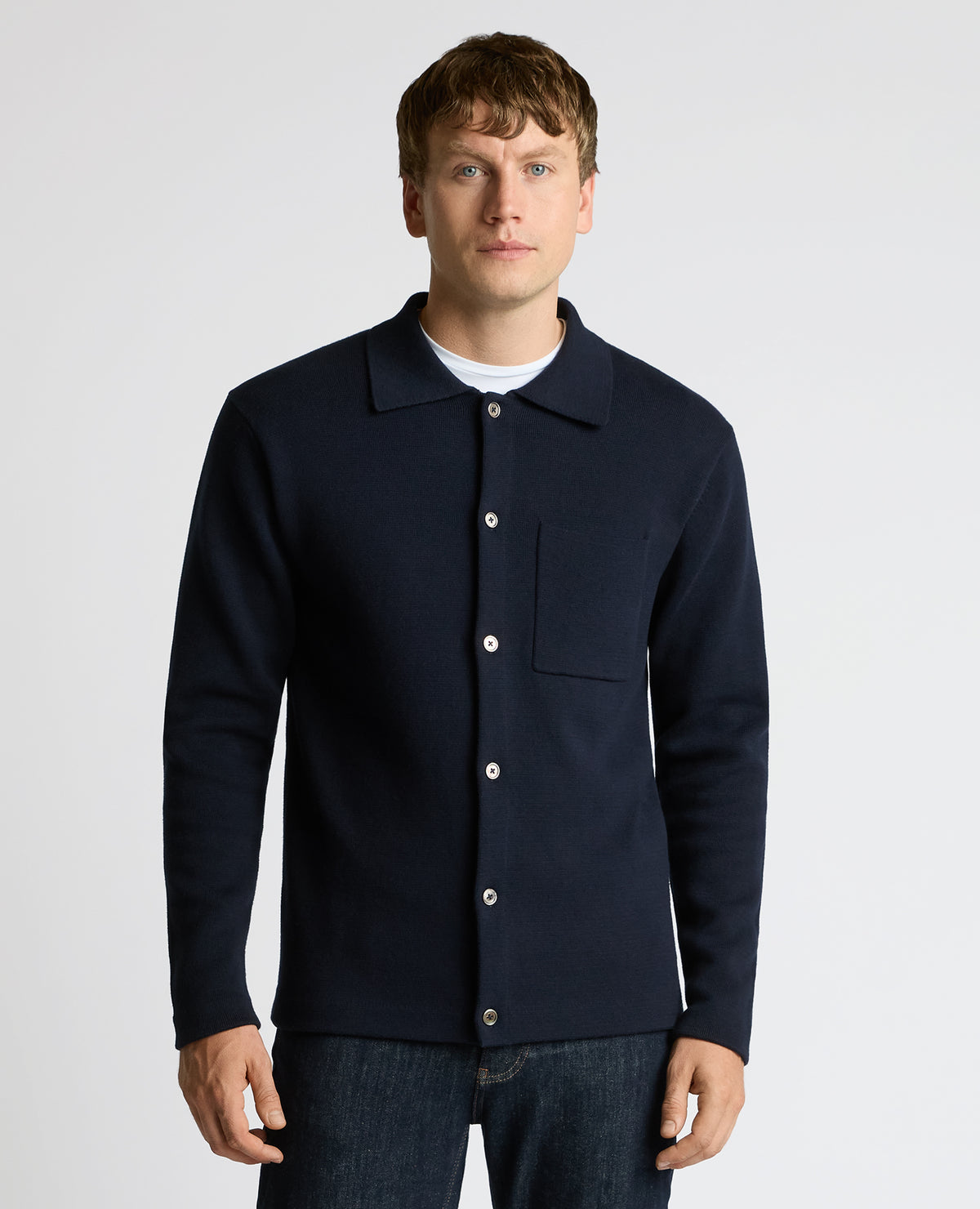 Man wearing a navy Button-Up Cotton Cardigan