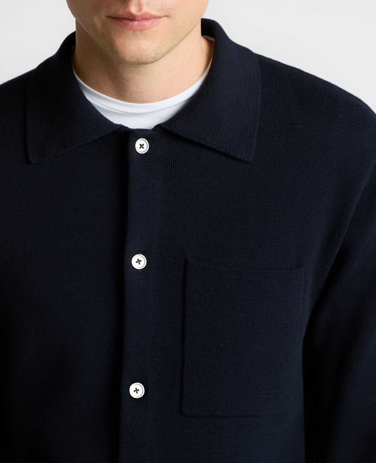 Man wearing a navy Button-Up Cotton Cardigan