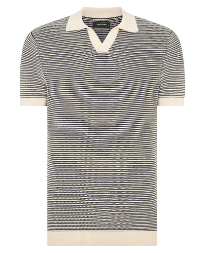 Man wearing a white and navy jumper