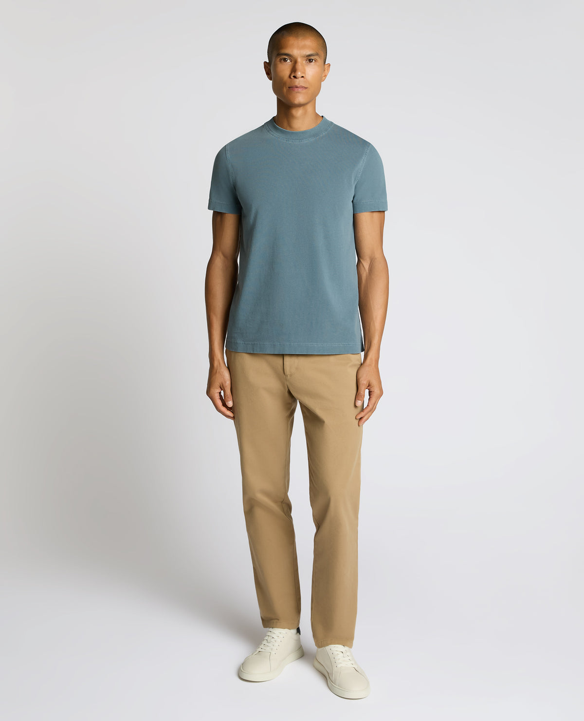 Man wearing a blue Relaxed Fit Organic Cotton T-Shirt