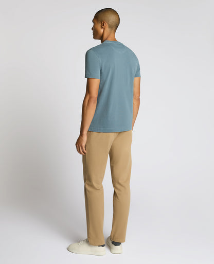Man wearing a blue Relaxed Fit Organic Cotton T-Shirt