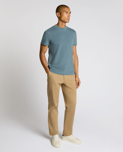 Man wearing a blue Relaxed Fit Organic Cotton T-Shirt