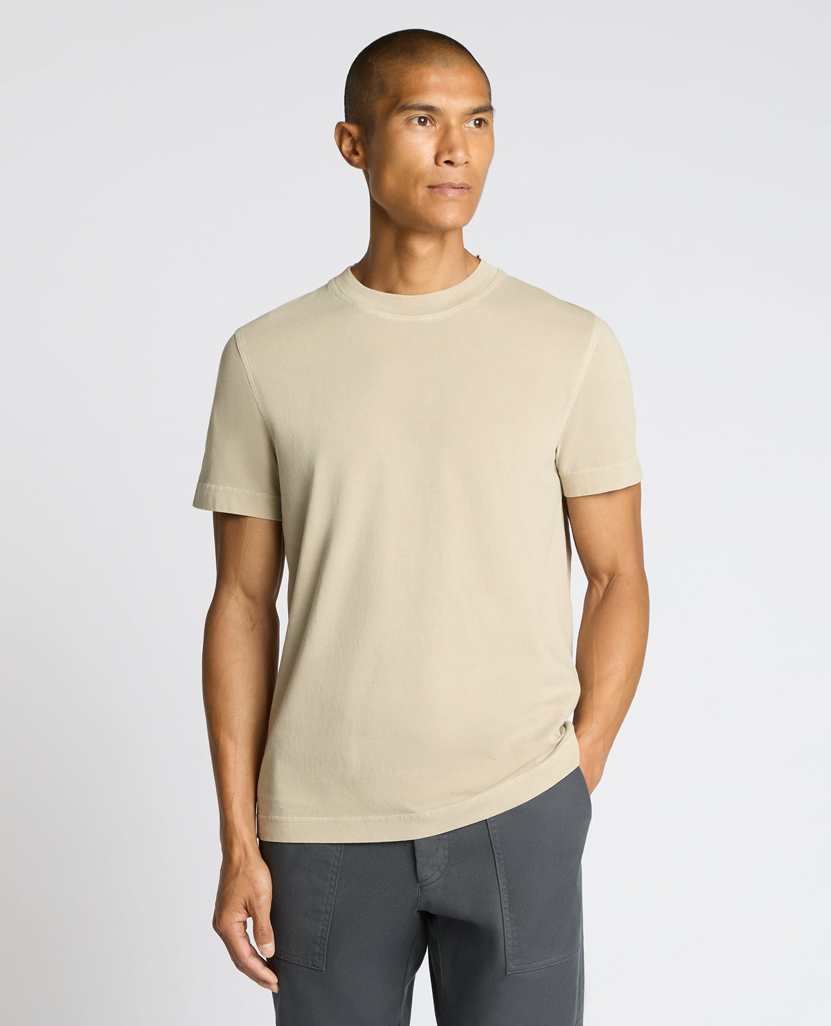 Man wearing a sand Relaxed Fit Organic Cotton T-Shirt