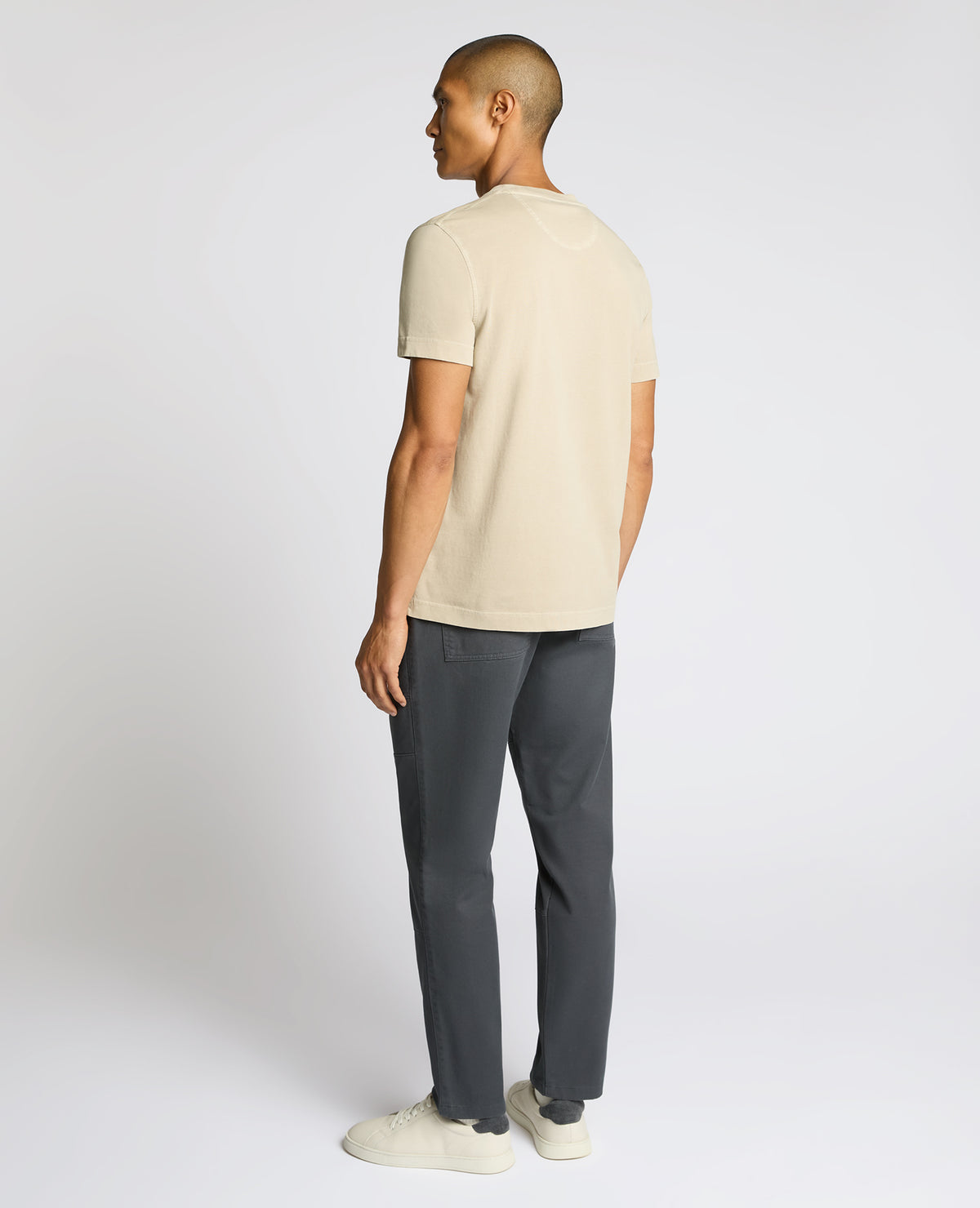 Man wearing a sand Relaxed Fit Organic Cotton T-Shirt