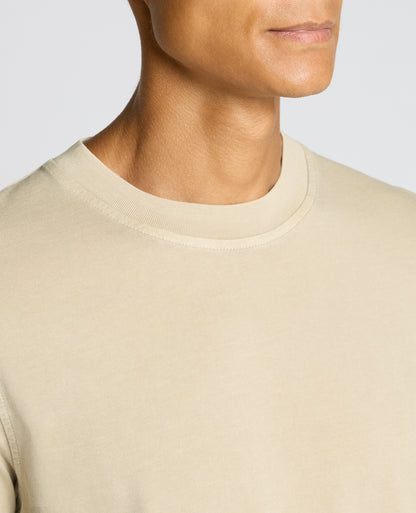 Man wearing a sand Relaxed Fit Organic Cotton T-Shirt