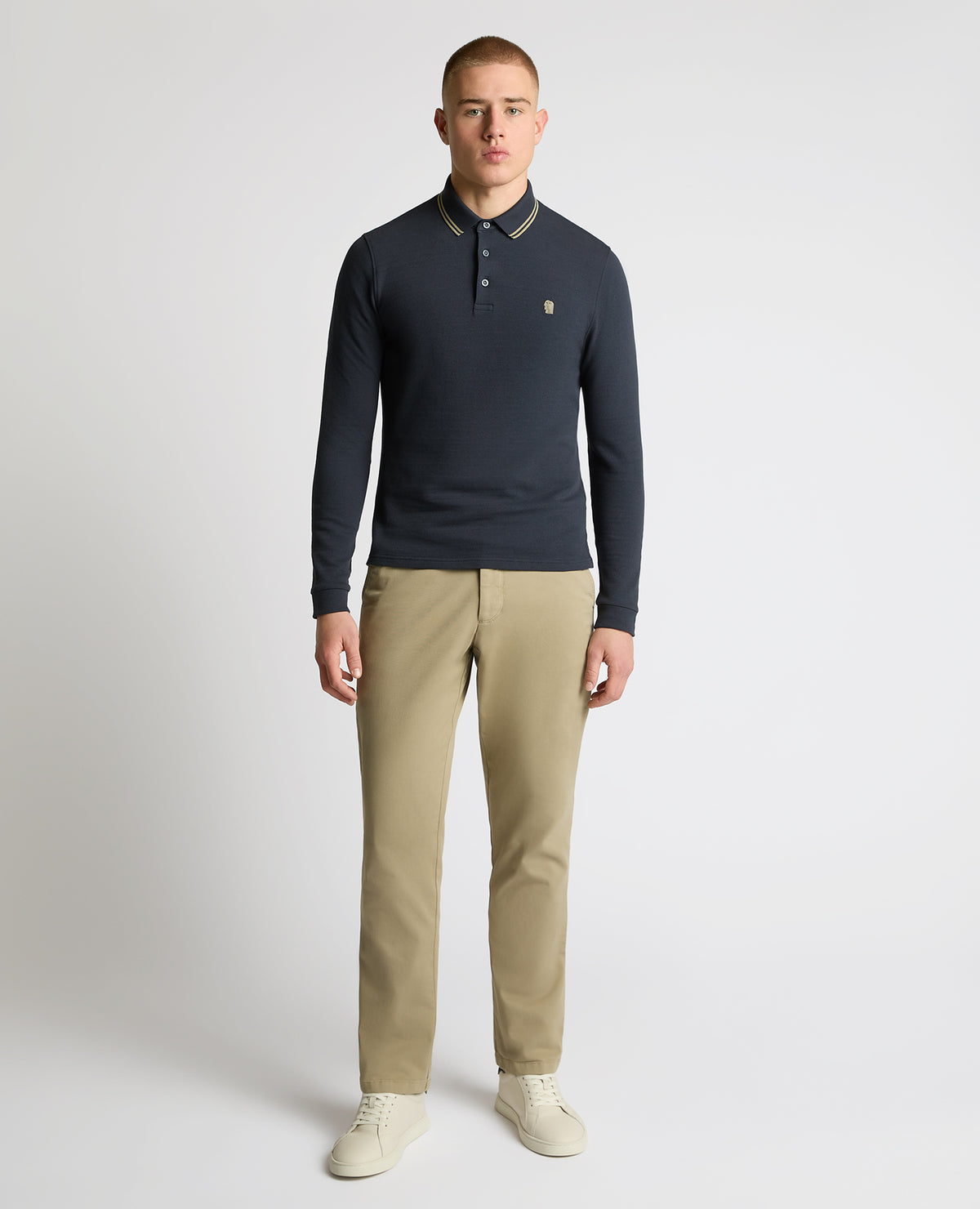 Man wearing a blue Contrast Collar Cotton-Stretch Polo