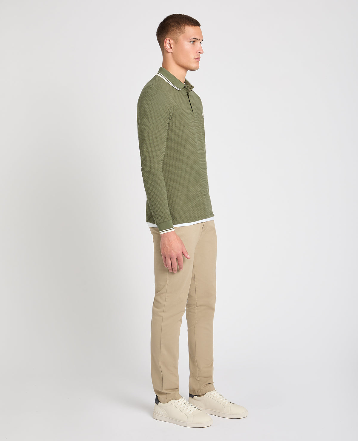 Man wearing a green jumper