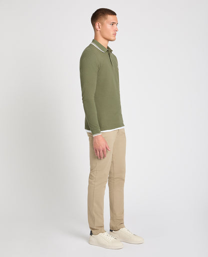 Man wearing a green jumper
