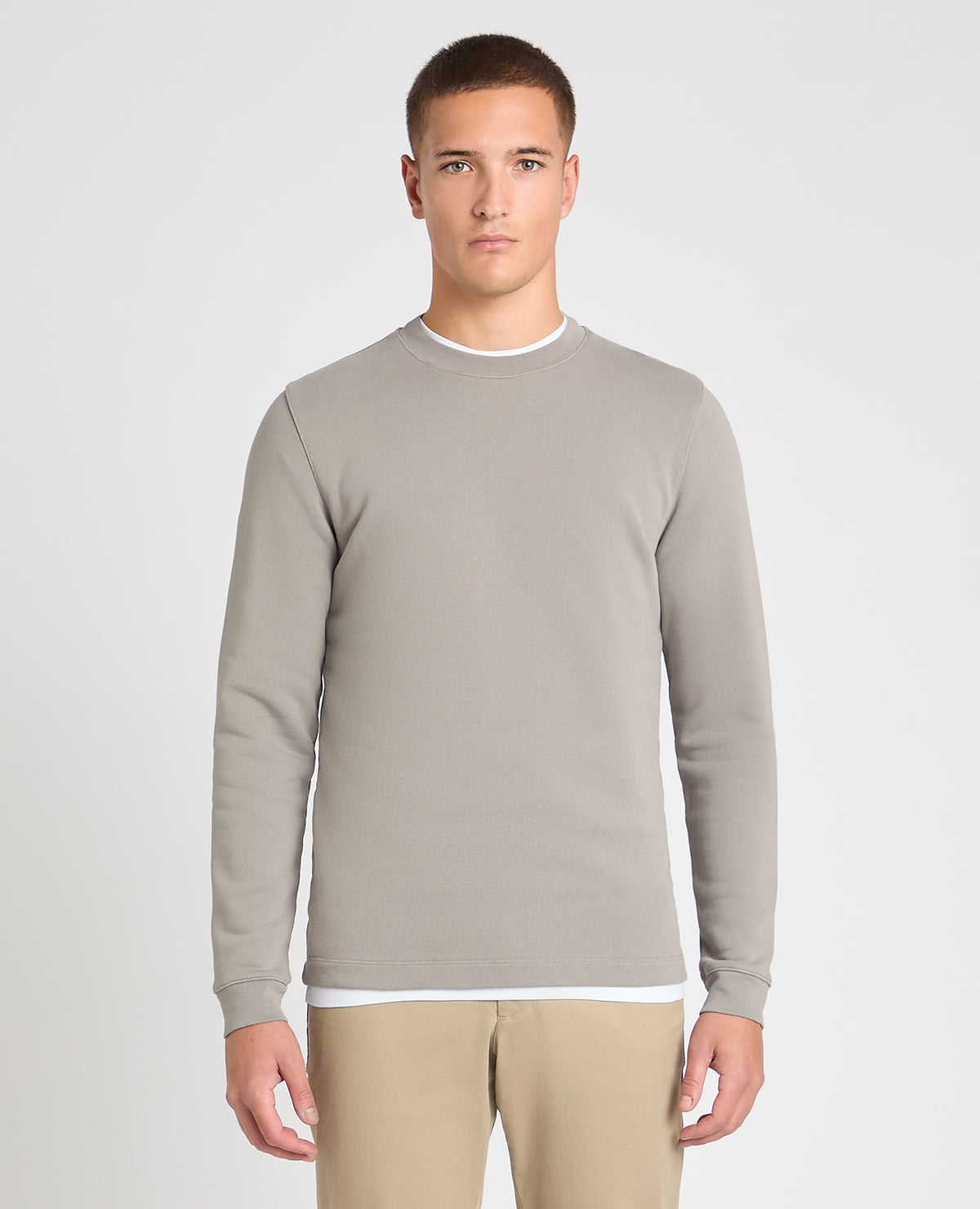 Man wearing a Grey jumper