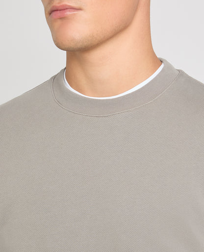 Man wearing a Grey jumper