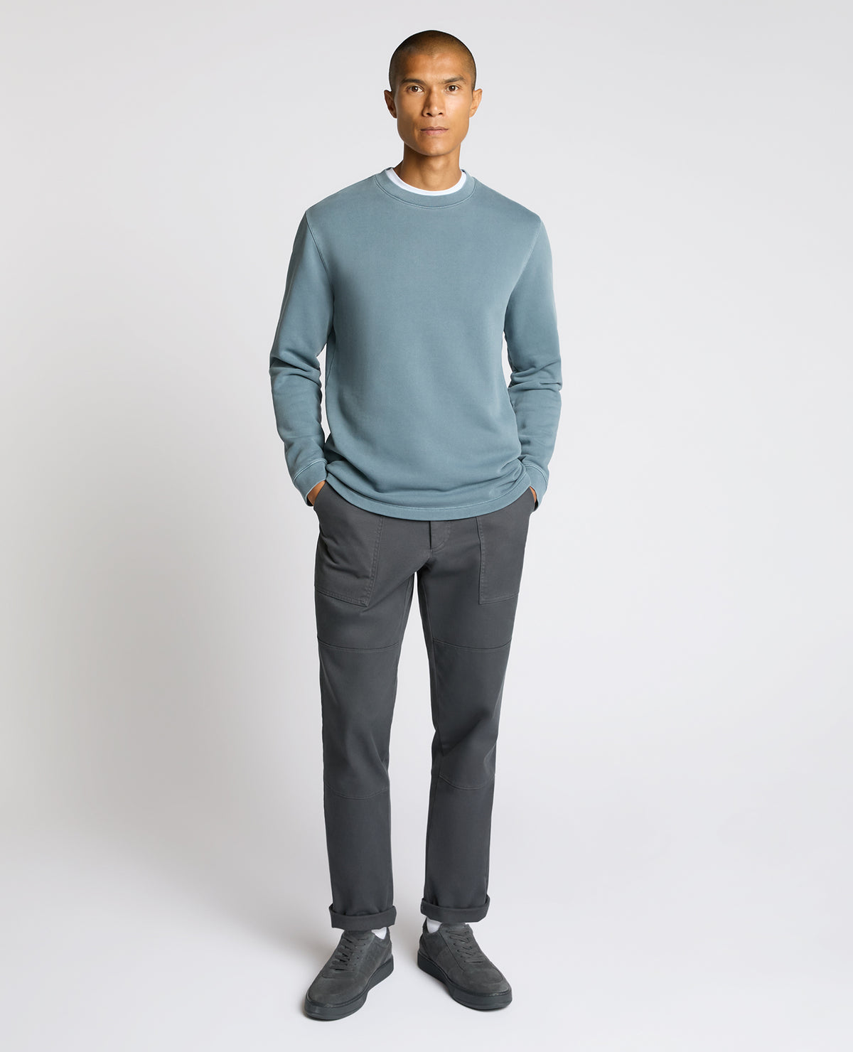 Man wearing a blue Crew Neck Jersey Sweatshirt