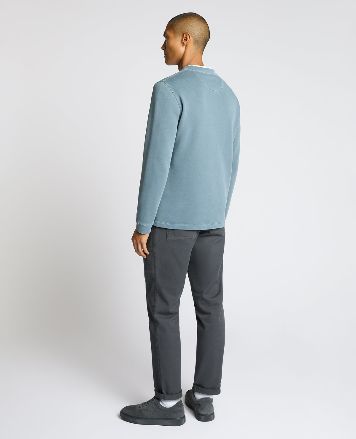 Man wearing a blue Crew Neck Jersey Sweatshirt