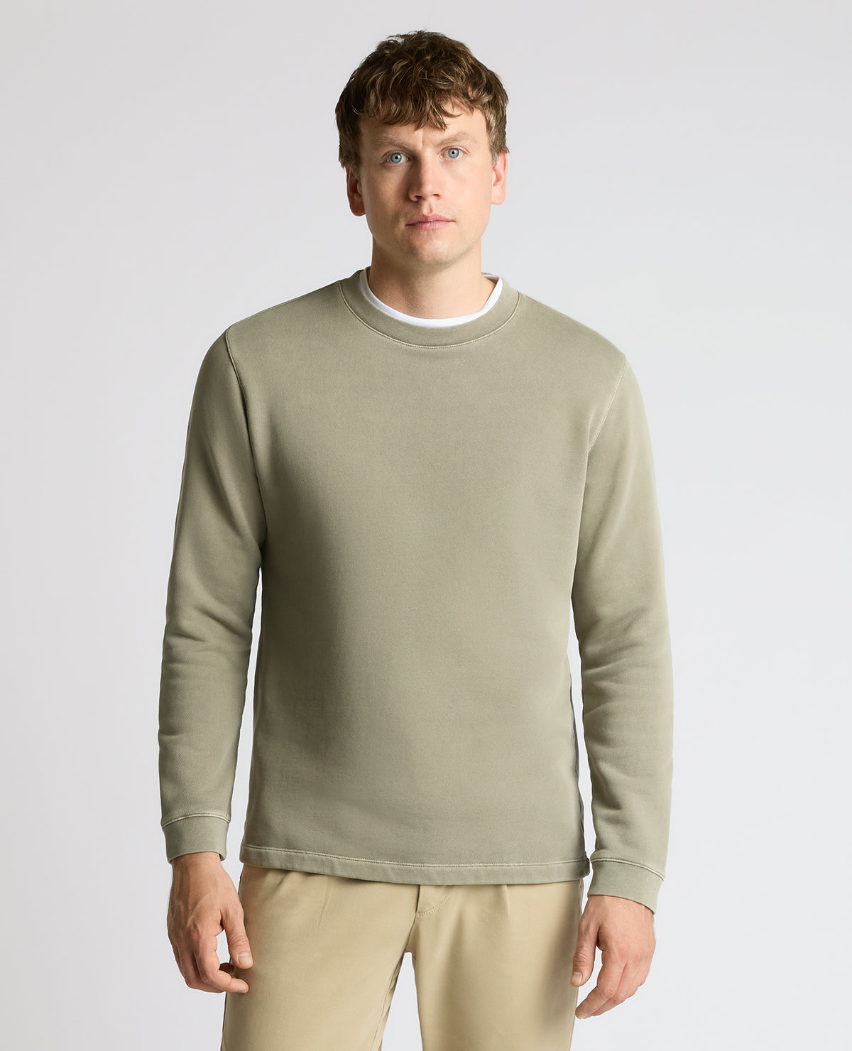 Man wearing a green Crew Neck Jersey Sweatshirt