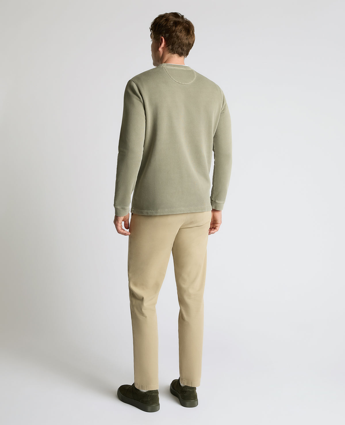 Man wearing a green Crew Neck Jersey Sweatshirt