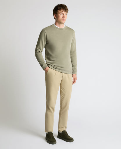 Man wearing a green Crew Neck Jersey Sweatshirt