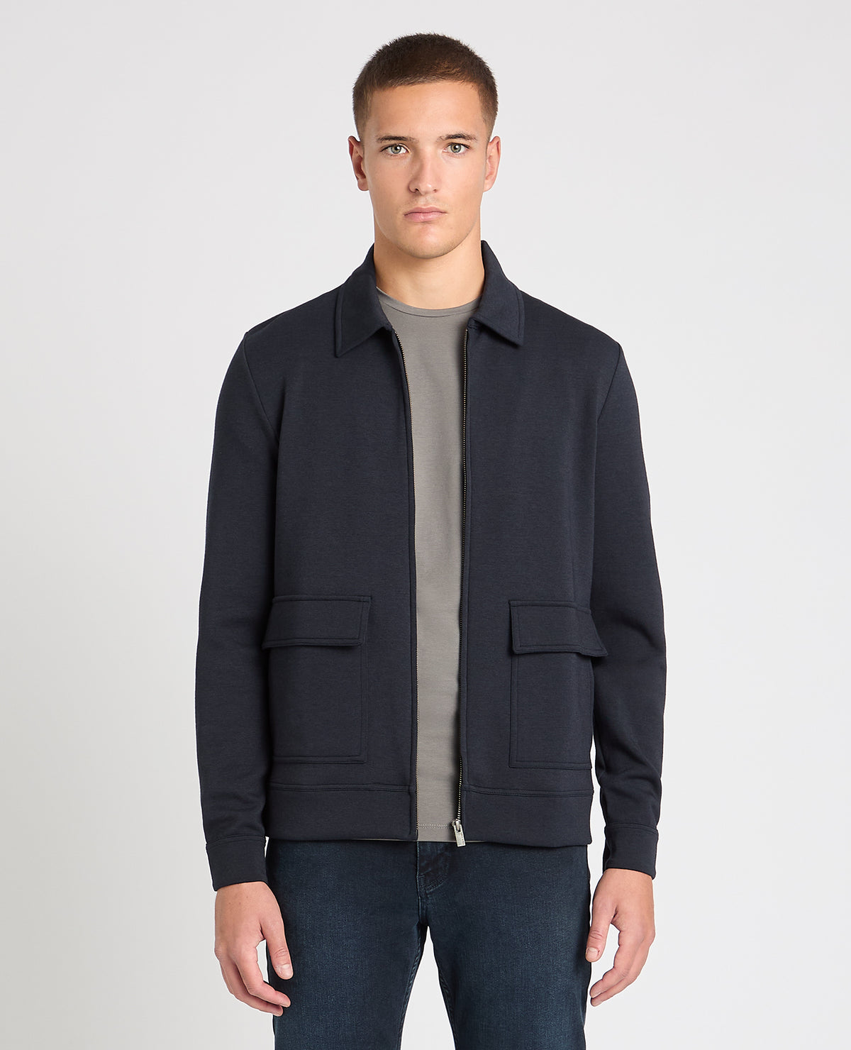 Man wearing a navy jumper
