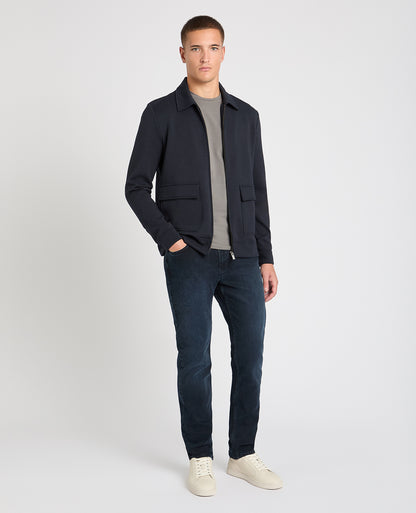 Man wearing a navy jumper