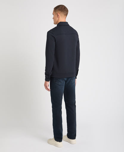 Man wearing a navy jumper