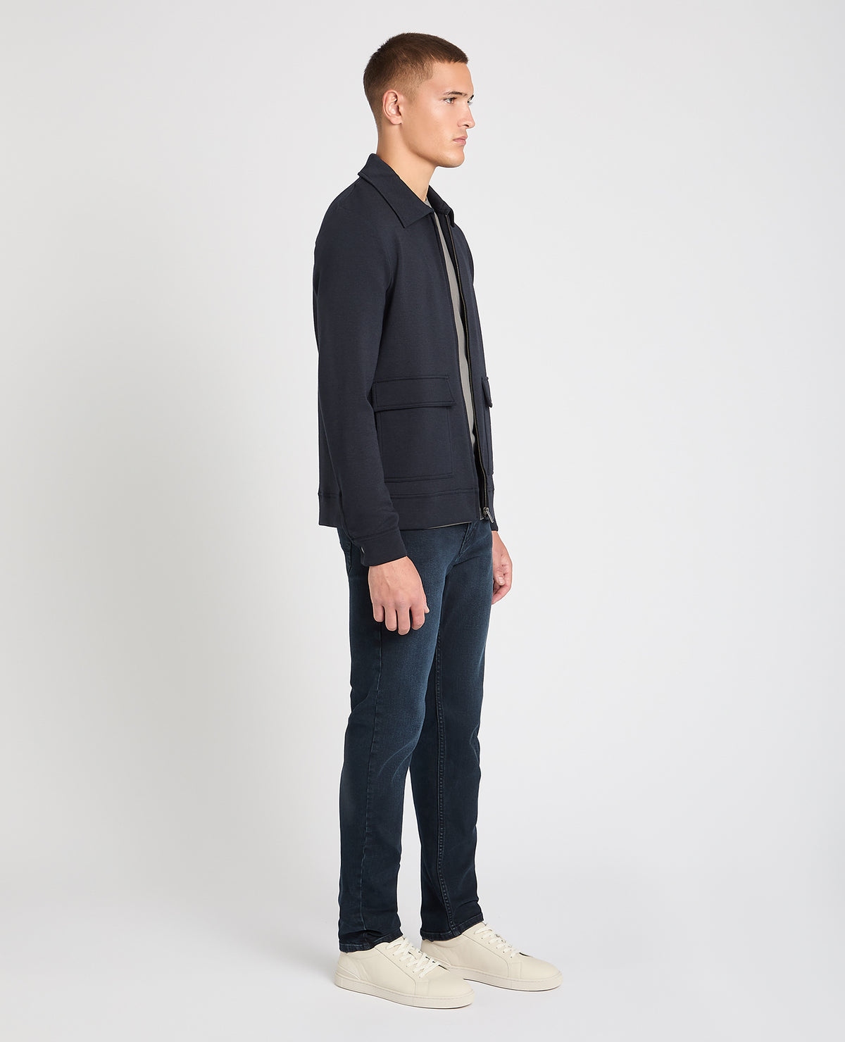 Man wearing a navy jumper