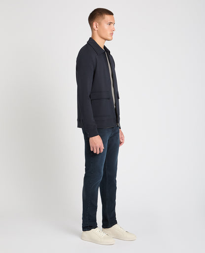 Man wearing a navy jumper