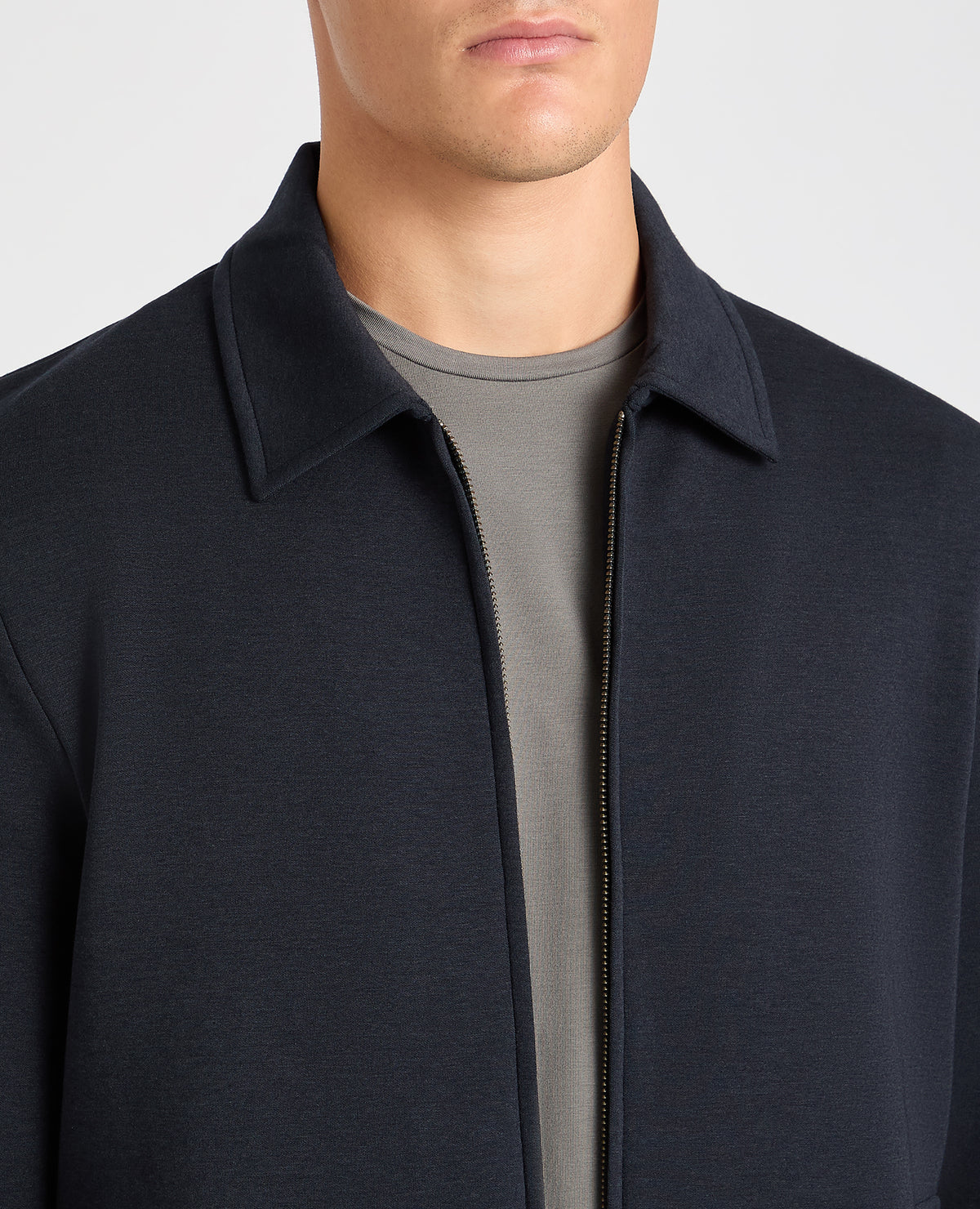 Man wearing a navy jumper