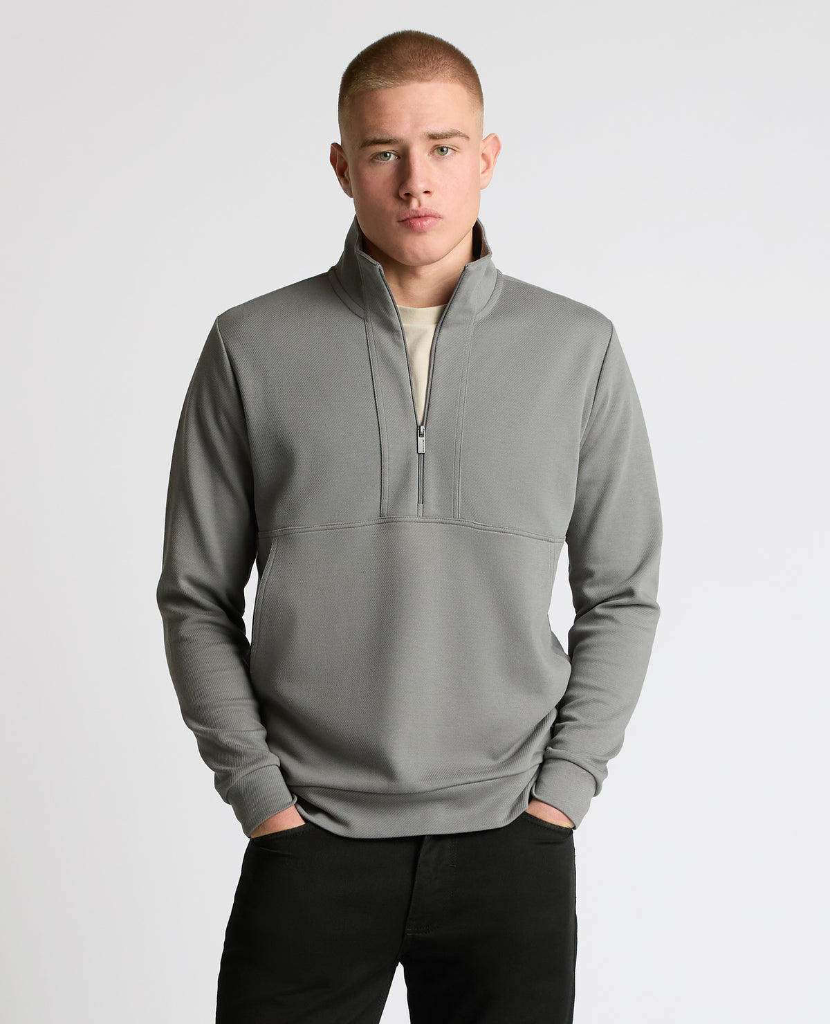 Man wearing a grey Half-Zip Jersey Sweatshirt