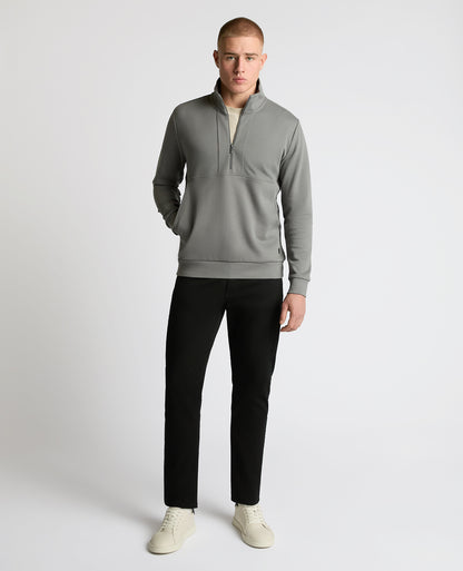 Man wearing a grey Half-Zip Jersey Sweatshirt