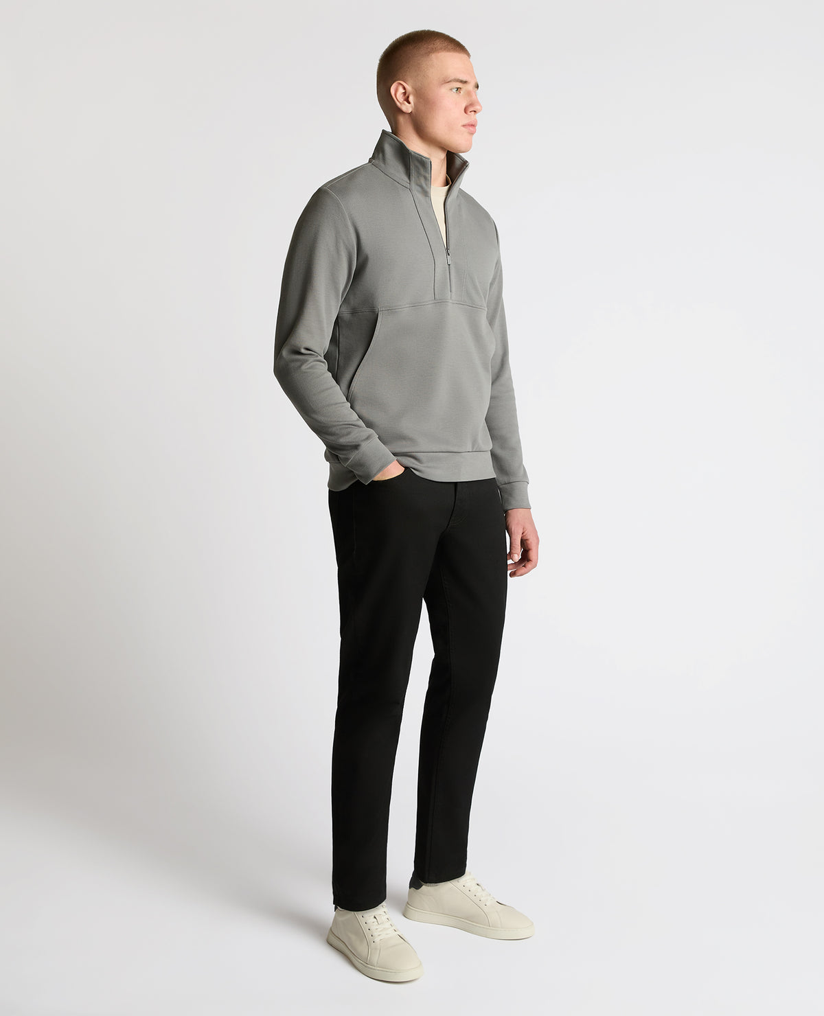 Man wearing a grey Half-Zip Jersey Sweatshirt