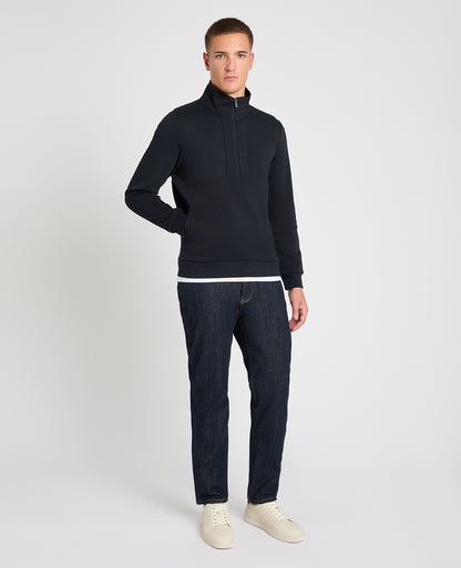 Man wearing a navy jumper
