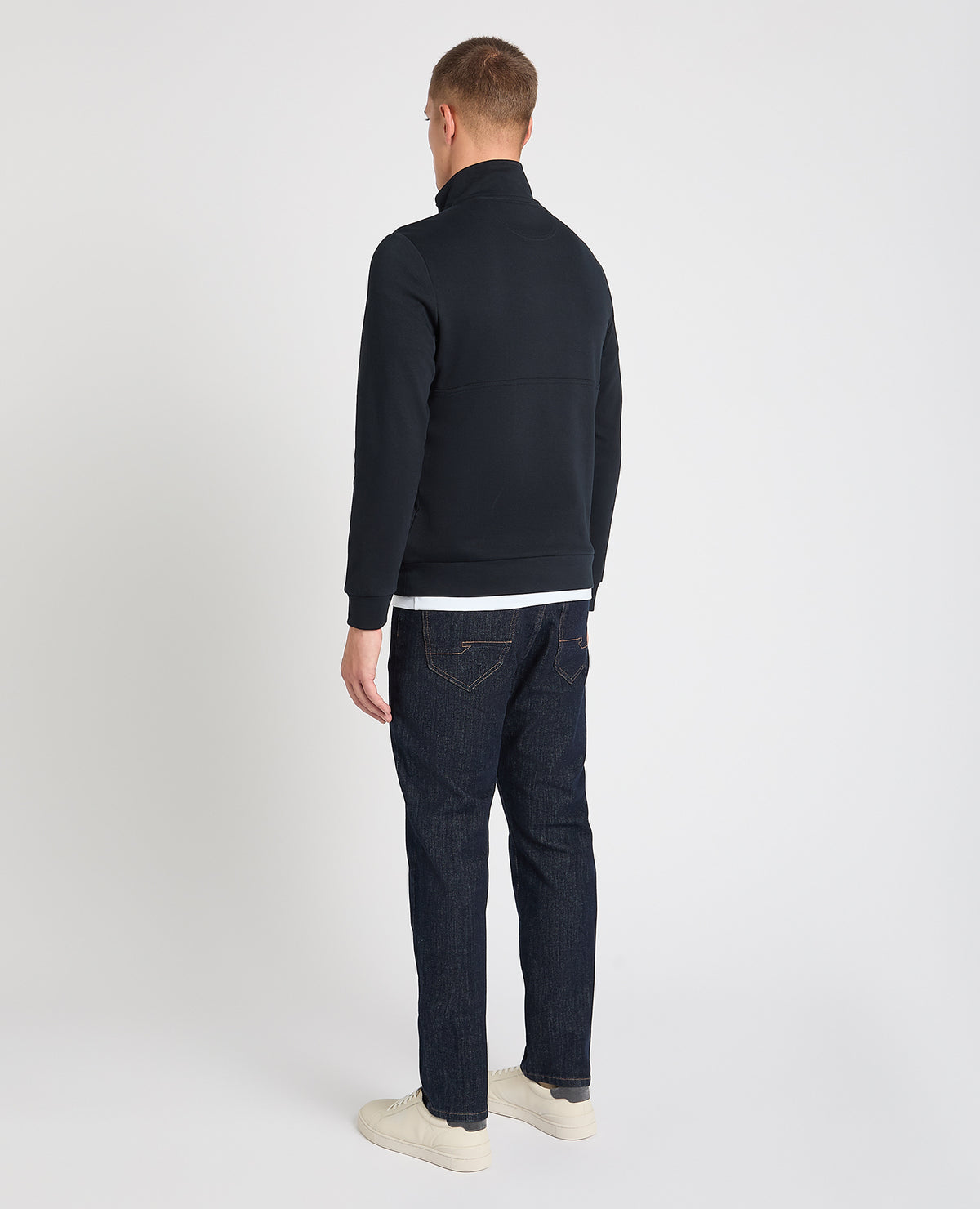 Man wearing a navy jumper