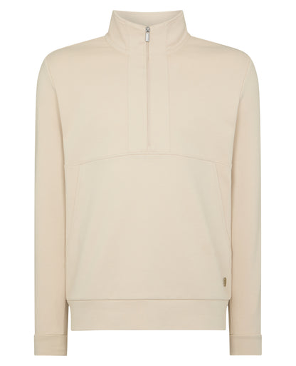 Man wearing a sand Half-Zip Jersey Sweatshirt