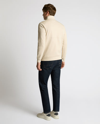 Man wearing a sand Half-Zip Jersey Sweatshirt
