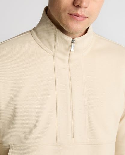 Man wearing a sand Half-Zip Jersey Sweatshirt