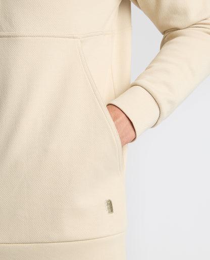 Man wearing a sand Half-Zip Jersey Sweatshirt